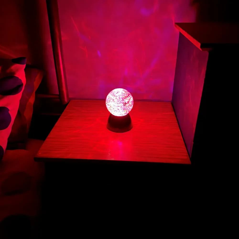 Glob senzorial luminos cu apa si sclipici — miniatură