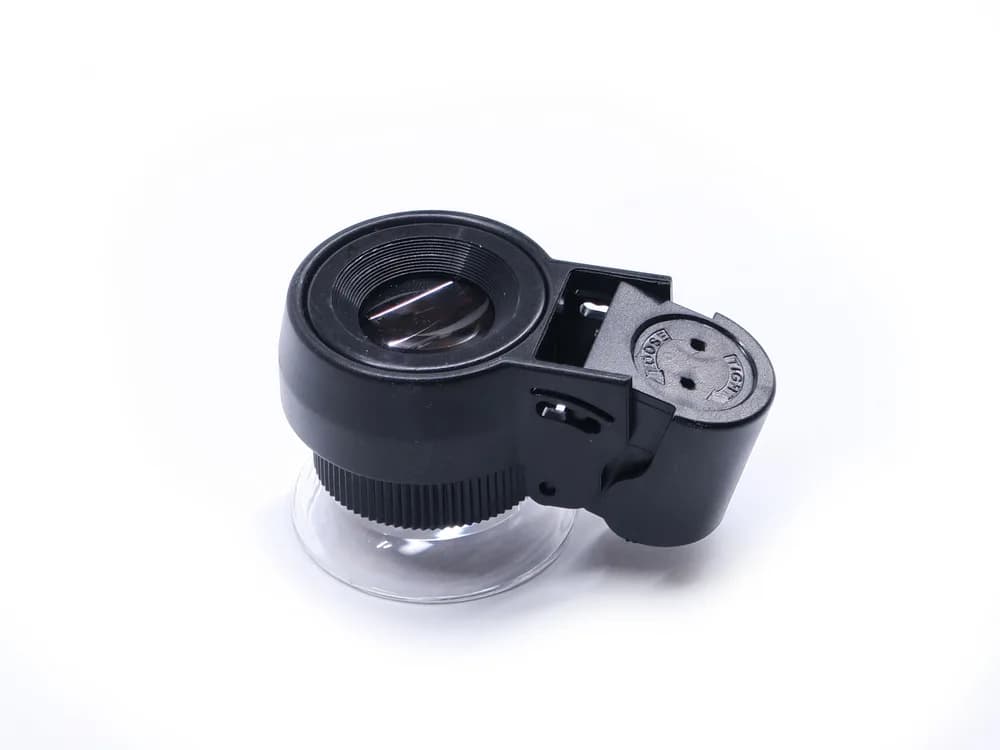 Microscop de mână 45x21 cu iluminare LED alb și UV