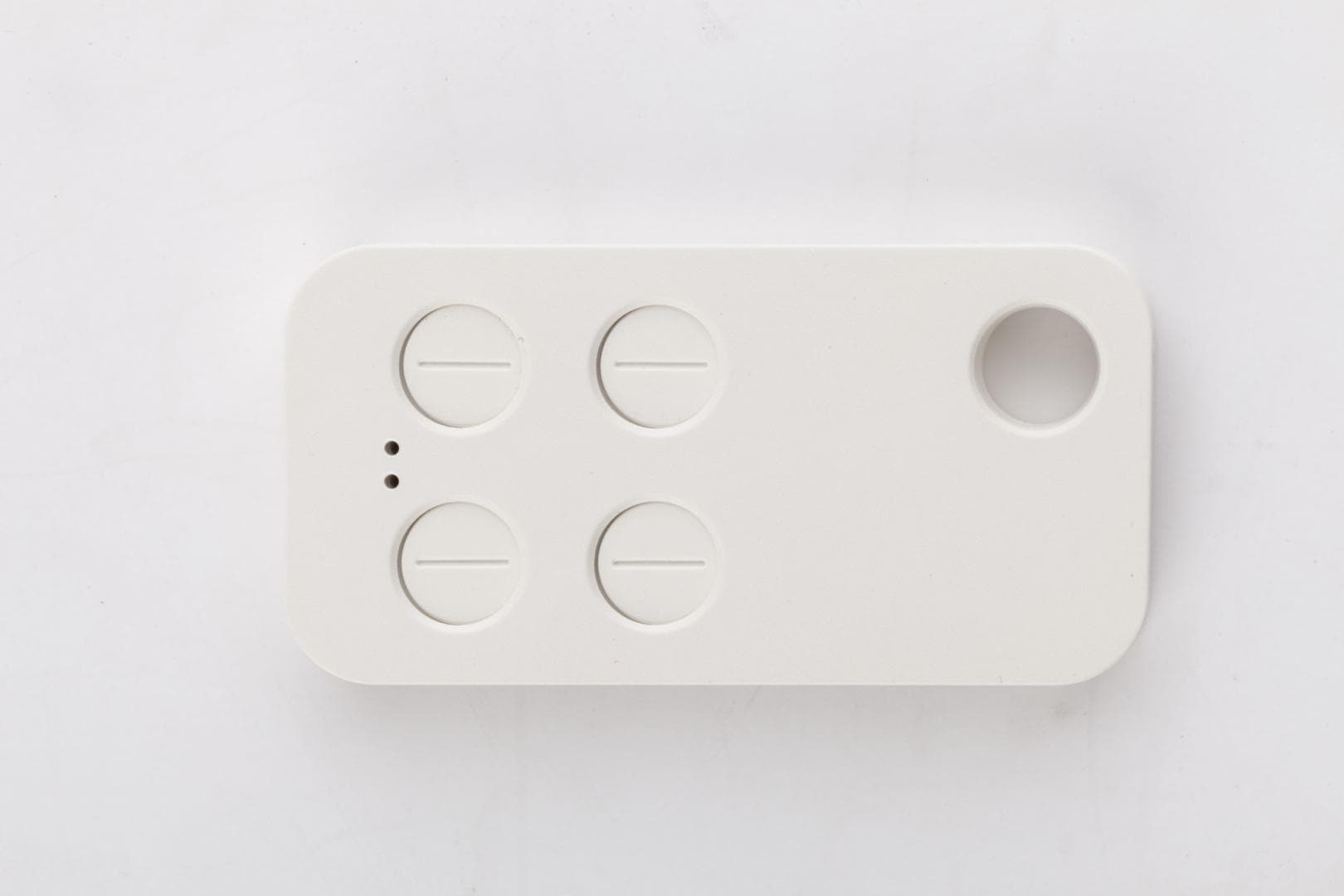 Telecomanda cu 4 butoane Venitem VELA 2.0W, Rolling code, frecventa 433,92 MHz, culoare alba, dimensiuni 70x35x9 mm, greutate 19g ( compatibilitate cu receiverul Vela RX 12-24, nu este inclus)